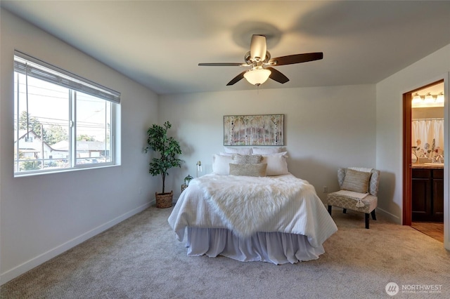 1011 S 64th St, Tacoma, WA 98408 - carpeted bedroom with connected bathroom and a ceiling fan