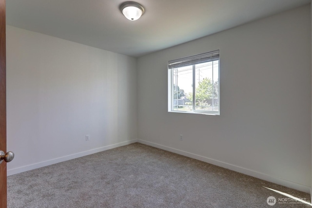 1011 S 64th St, Tacoma, WA 98408 - empty room with carpet and baseboards