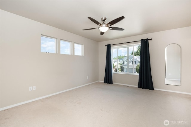 1228 81st Dr SE, Lake Stevens, WA 98258 - spare room with light carpet and ceiling fan