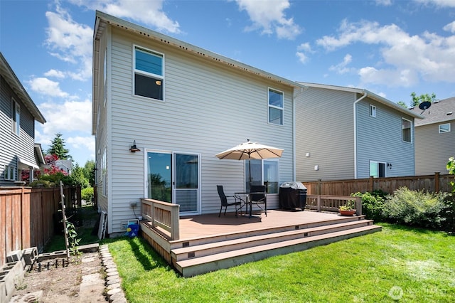1228 81st Dr SE, Lake Stevens, WA 98258 - back of house featuring a fenced backyard and a deck