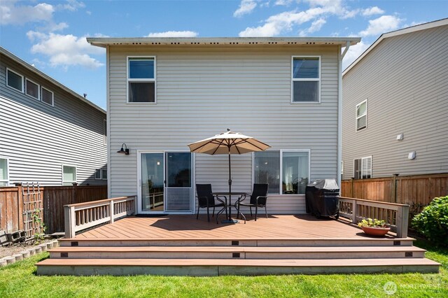 1228 81st Dr SE, Lake Stevens, WA 98258 - back of house with a fenced backyard and a deck