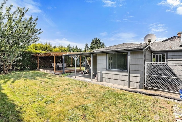 4515 14th Way SE, Lacey, WA 98503 - view of side of property featuring a lawn, a pergola, a patio area, and roof with shingles
