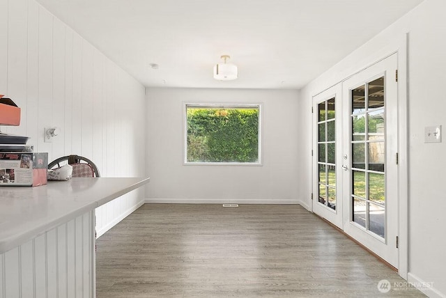 4515 14th Way SE, Lacey, WA 98503 - unfurnished dining area featuring wood finished floors and french doors