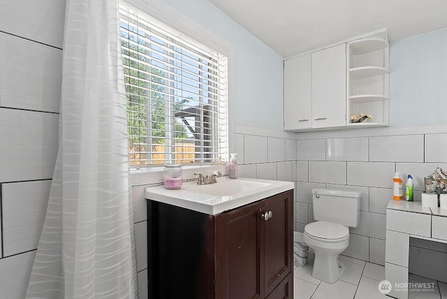4515 14th Way SE, Lacey, WA 98503 - full bathroom with tile patterned flooring, tile walls, and vanity