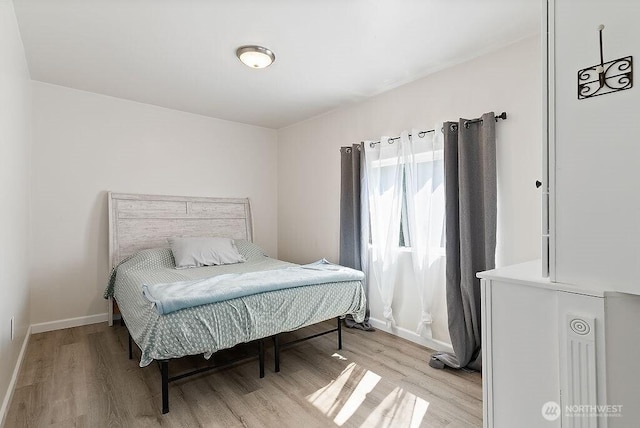 4515 14th Way SE, Lacey, WA 98503 - bedroom featuring light wood finished floors and baseboards