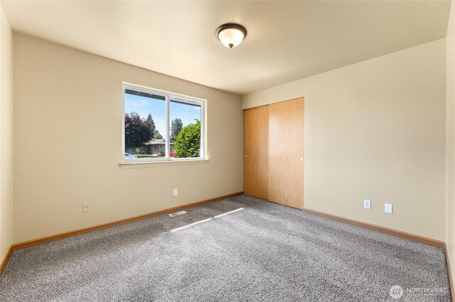 1875 Florence St, Enumclaw, WA 98022 - carpeted spare room featuring baseboards