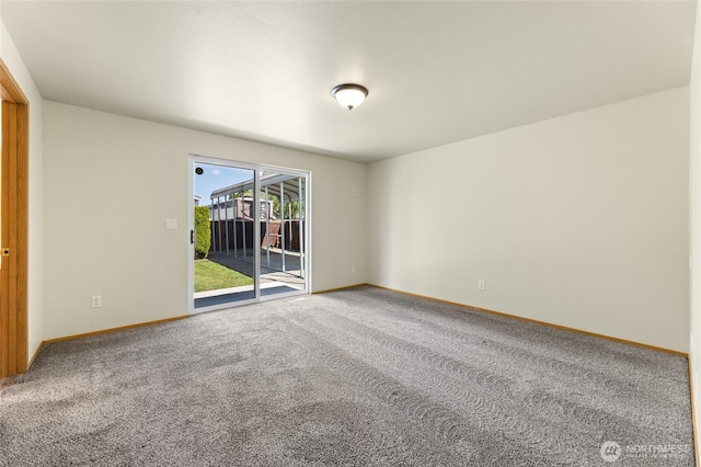 1875 Florence St, Enumclaw, WA 98022 - empty room featuring carpet floors and baseboards