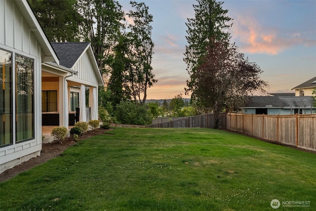1521 8th St SW, Puyallup, WA 98371 - yard at dusk with a fenced backyard