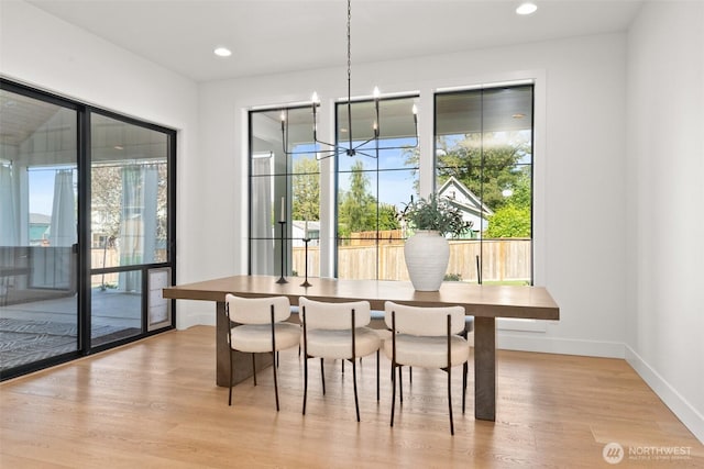 1521 8th St SW, Puyallup, WA 98371 - dining space featuring a chandelier, wood finished floors, and recessed lighting