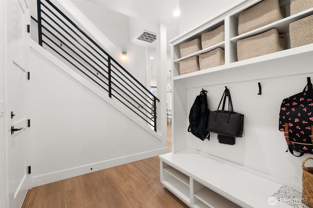 1521 8th St SW, Puyallup, WA 98371 - mudroom with light wood-style flooring and baseboards
