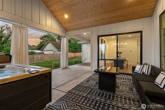 1521 8th St SW, Puyallup, WA 98371 - view of patio / terrace featuring a hot tub and an outdoor living space