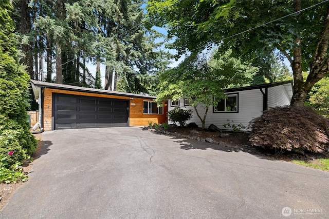 5206 68th Ave W, University Place, WA 98467 - view of front of home featuring driveway and a garage