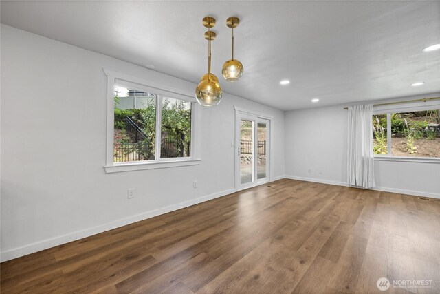 5206 68th Ave W, University Place, WA 98467 - spare room featuring wood finished floors and recessed lighting