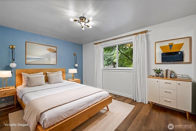 5206 68th Ave W, University Place, WA 98467 - bedroom with dark wood-type flooring