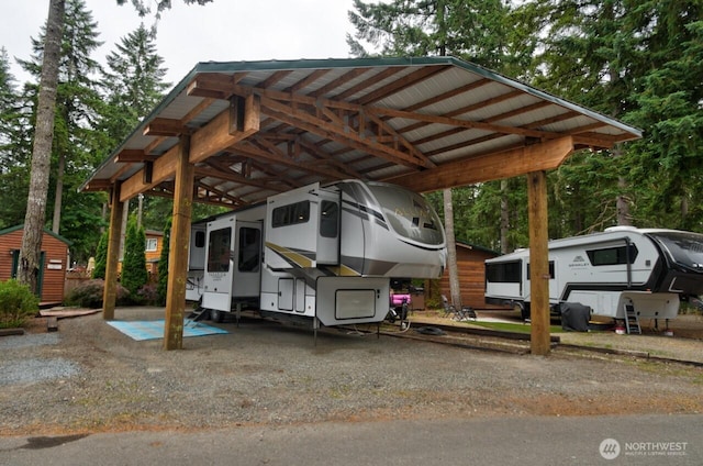1546 Reservation Rd SE Unit 222, Olympia, WA 98513 - view of parking / parking lot featuring a carport