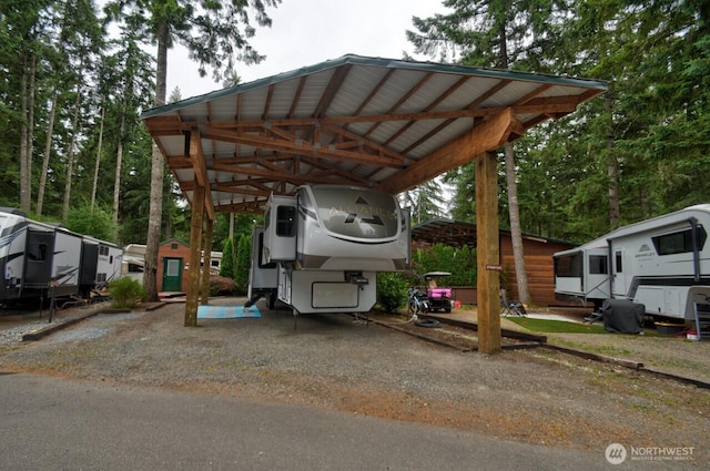 1546 Reservation Rd SE Unit 222, Olympia, WA 98513 - view of parking with a carport