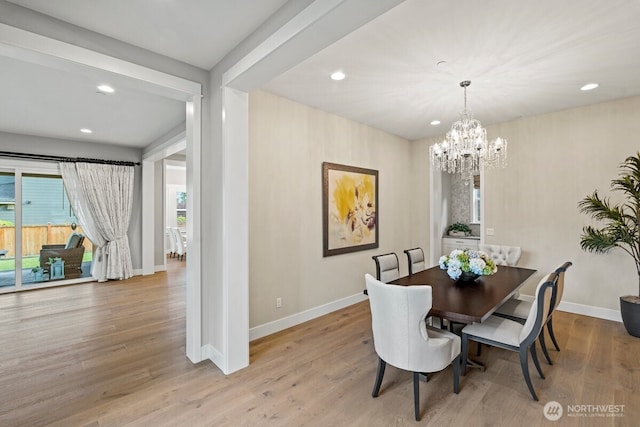 3348 218th St SE, Bothell, WA 98021 - dining space featuring a chandelier, wood finished floors, and recessed lighting