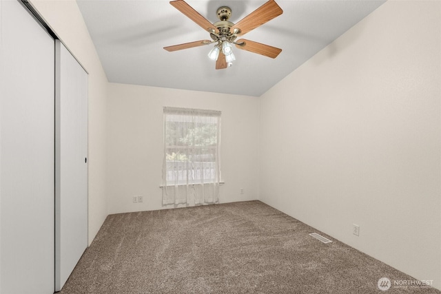 158 S Fork Rd, Raymond, WA 98577 - unfurnished bedroom featuring carpet flooring, a closet, and ceiling fan