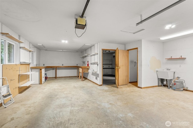 158 S Fork Rd, Raymond, WA 98577 - garage with a garage door opener and a sink