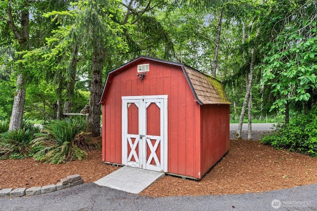 158 S Fork Rd, Raymond, WA 98577 - view of shed featuring view of scattered trees