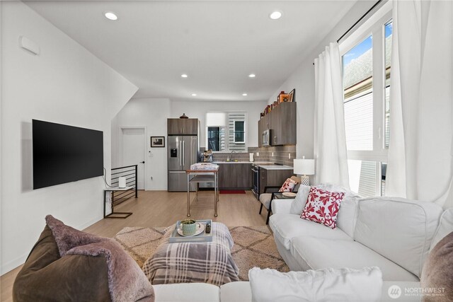 1734 NW 62nd St Unit A, Seattle, WA 98107 - living area featuring light wood-type flooring and recessed lighting