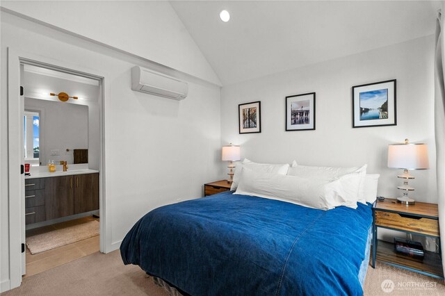 1734 NW 62nd St Unit A, Seattle, WA 98107 - bedroom featuring a wall mounted AC, lofted ceiling, ensuite bathroom, and light carpet