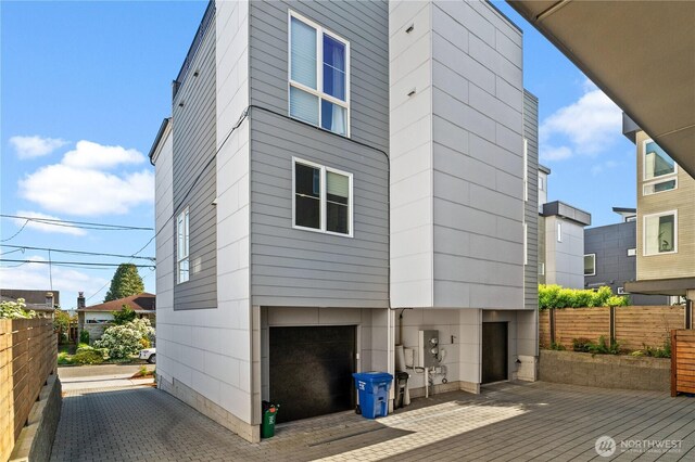 1734 NW 62nd St Unit A, Seattle, WA 98107 - view of side of property featuring a deck