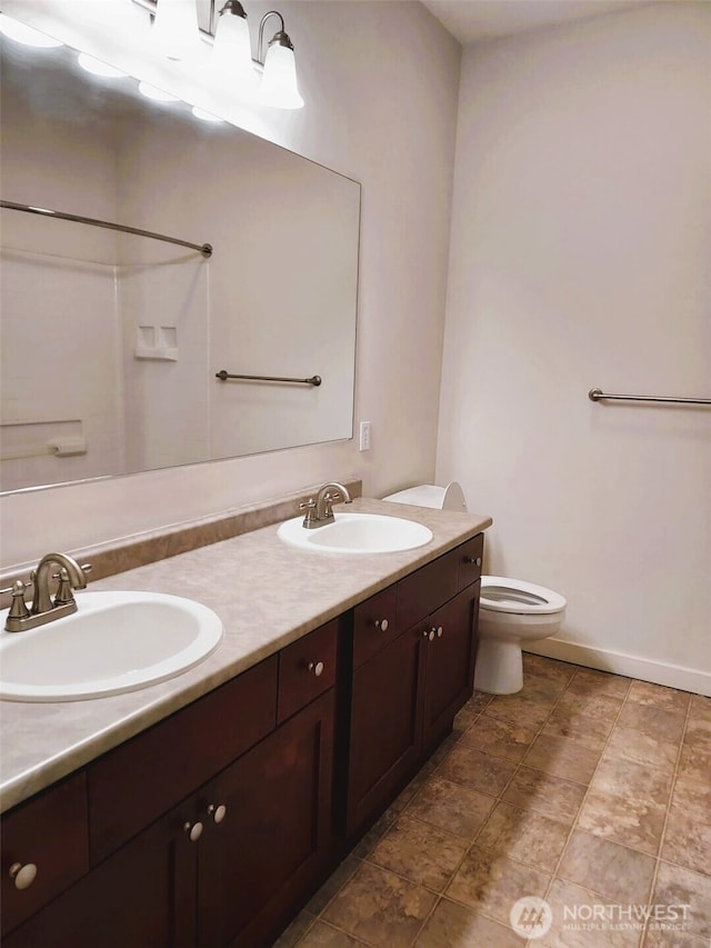 25025 SE Klahanie Blvd Unit D202, Sammamish, WA 98029 - bathroom with toilet and double vanity