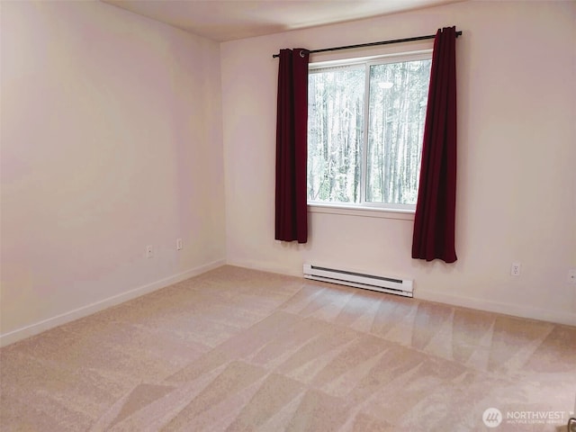 25025 SE Klahanie Blvd Unit D202, Sammamish, WA 98029 - carpeted empty room with a baseboard heating unit and baseboards