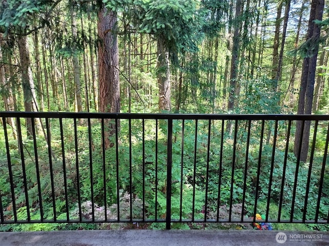 25025 SE Klahanie Blvd Unit D202, Sammamish, WA 98029 - balcony featuring a view of trees