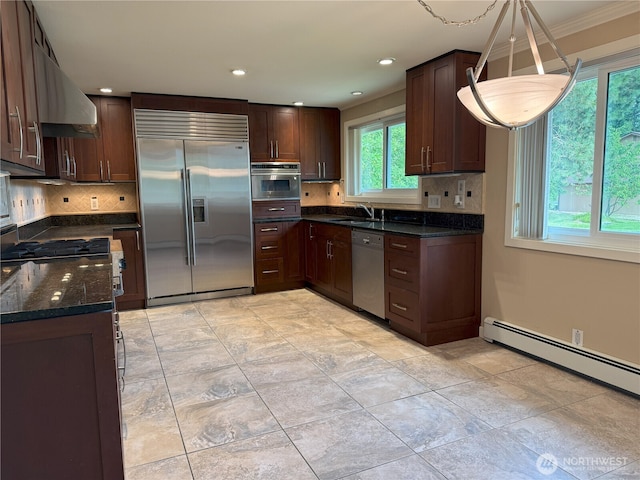 3410 Forest Ct, Bellingham, WA 98225 - kitchen featuring stainless steel appliances, backsplash, dark brown cabinets, dark stone counters, and recessed lighting