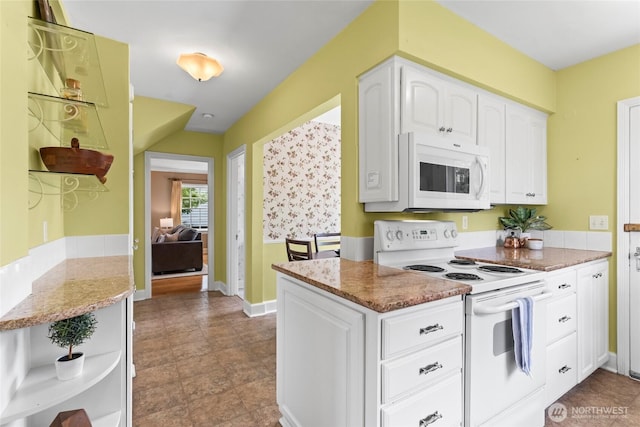 4116 N 39th St, Tacoma, WA 98407 - kitchen featuring white appliances, white cabinetry, light stone countertops, and open shelves