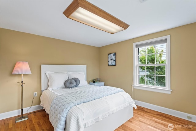 4116 N 39th St, Tacoma, WA 98407 - bedroom with baseboards and wood finished floors