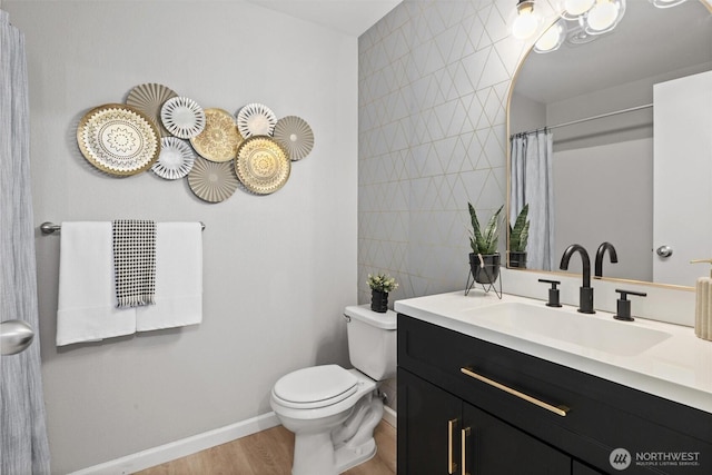 5300 Harbour Pointe Blvd Unit 311B, Mukilteo, WA 98275 - bathroom featuring vanity, wood finished floors, and tile walls