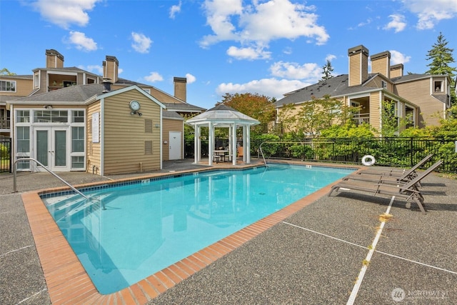 5300 Harbour Pointe Blvd Unit 311B, Mukilteo, WA 98275 - community pool with french doors, a gazebo, and a patio area