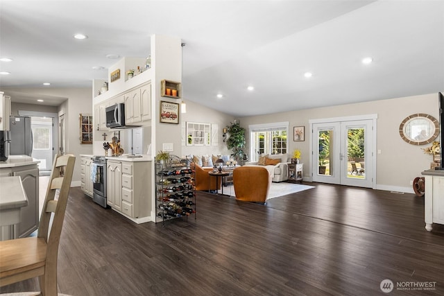 5810 246th St E, Graham, WA 98338 - kitchen with stainless steel appliances, light countertops, open floor plan, dark wood-type flooring, and recessed lighting
