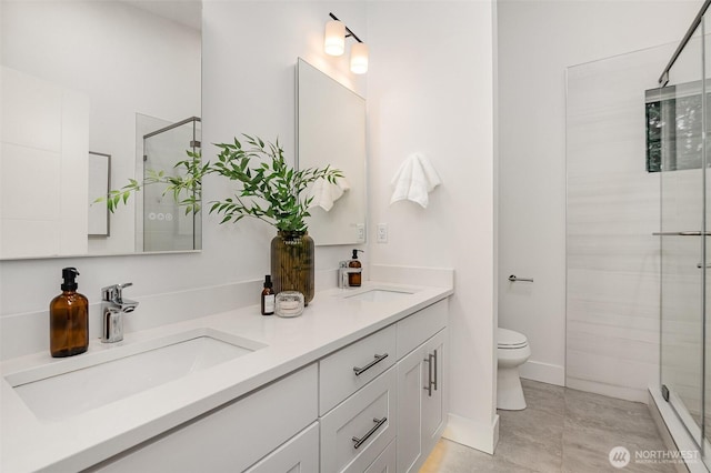 7731 NE 175th St Unit 102, Kenmore, WA 98028 - bathroom with a stall shower and double vanity