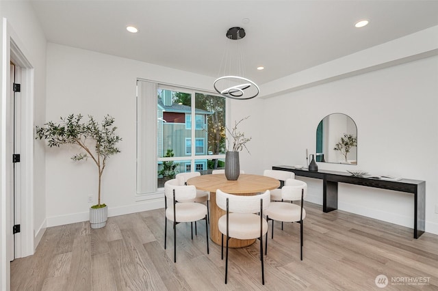 7731 NE 175th St Unit 102, Kenmore, WA 98028 - dining room featuring light wood-type flooring and recessed lighting
