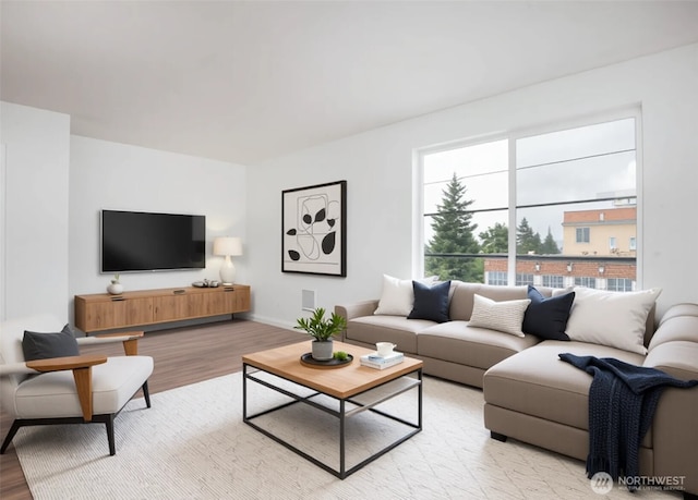 1000 NE 88th St Unit 303, Seattle, WA 98115 - living area featuring light wood-type flooring and baseboards