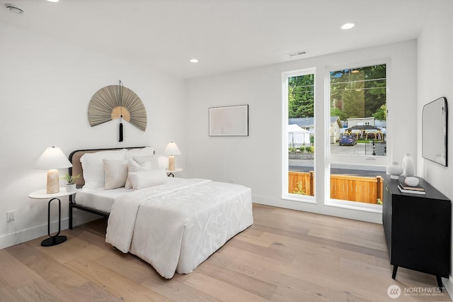 3983 162nd Pl SE, Bellevue, WA 98006 - bedroom with light wood-type flooring and recessed lighting