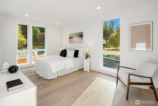 3983 162nd Pl SE, Bellevue, WA 98006 - bedroom with light wood-type flooring and recessed lighting