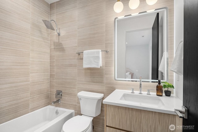 3983 162nd Pl SE, Bellevue, WA 98006 - bathroom with vanity, tile walls, and tub / shower combination