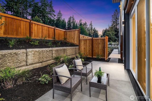 3983 162nd Pl SE, Bellevue, WA 98006 - patio terrace at dusk with a patio and a fenced backyard
