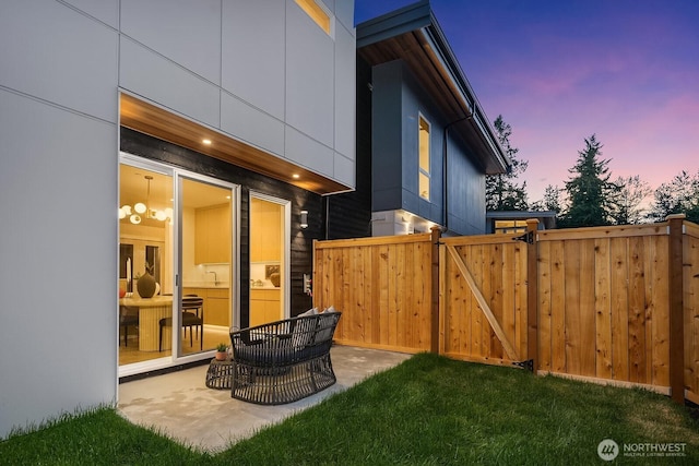 3983 162nd Pl SE, Bellevue, WA 98006 - yard at dusk with a gate and a sink
