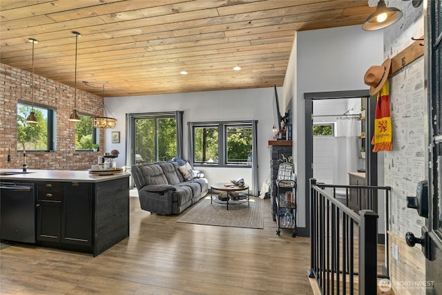 1712 Nelson Siding Rd, Cle Elum, WA 98922 - kitchen with wood ceiling, dark cabinets, dishwashing machine, open floor plan, and wood finished floors