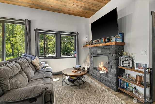 1712 Nelson Siding Rd, Cle Elum, WA 98922 - living area featuring wood ceiling, healthy amount of natural light, a fireplace, and wood finished floors
