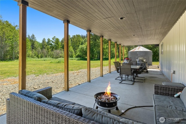 1712 Nelson Siding Rd, Cle Elum, WA 98922 - view of patio / terrace with an outdoor fire pit and outdoor dining space