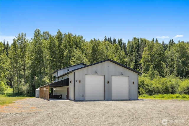 1712 Nelson Siding Rd, Cle Elum, WA 98922 - garage with a garage and a forest view