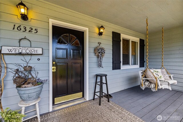 16325 Tareyton Ln SE, Yelm, WA 98597 - view of exterior entry featuring covered porch