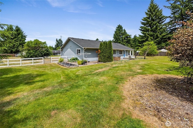 16325 Tareyton Ln SE, Yelm, WA 98597 - view of yard featuring a vegetable garden